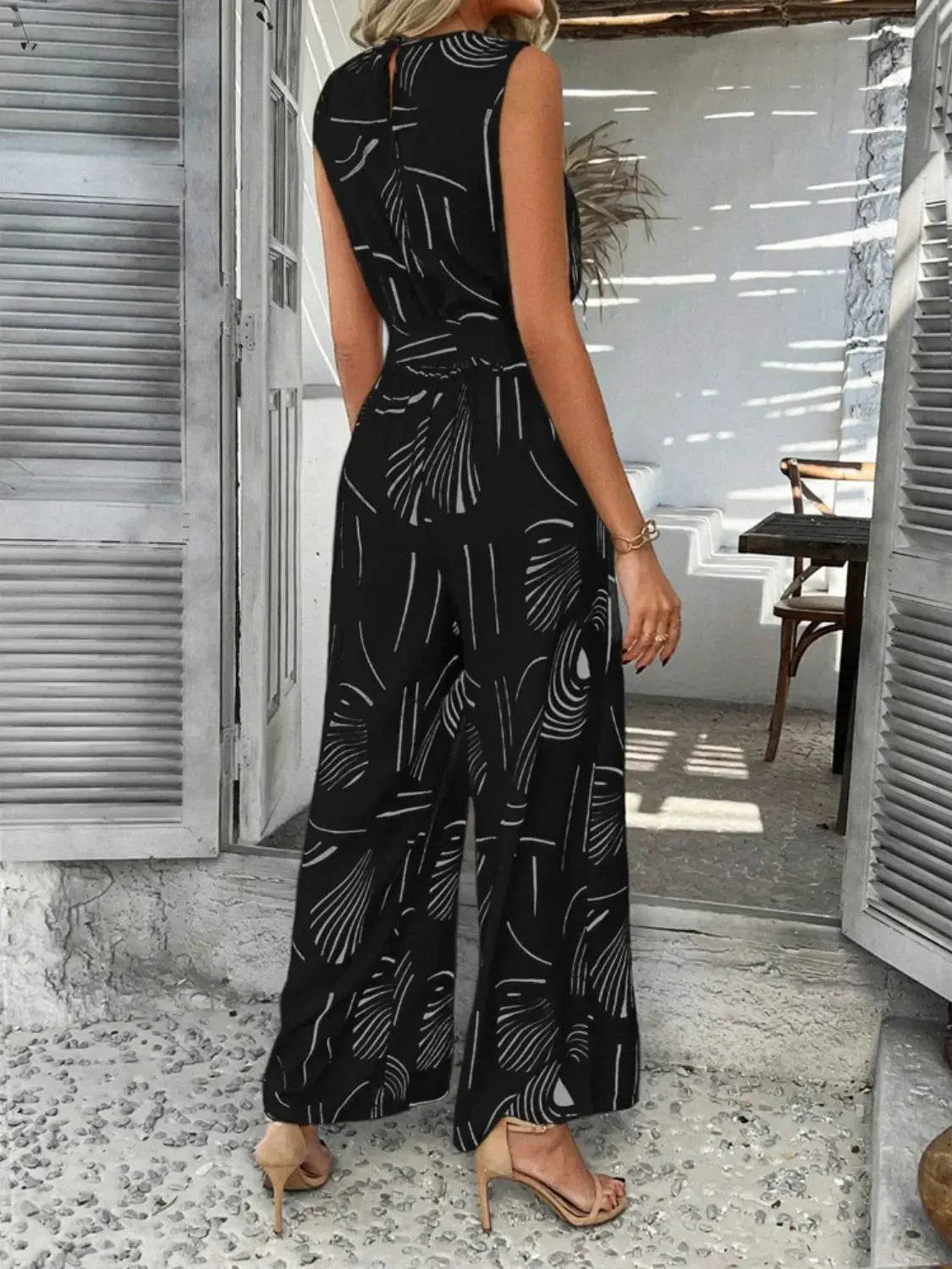 Printed Round Neck Sleeveless Tie Waist Jumpsuit - Velveta Studio