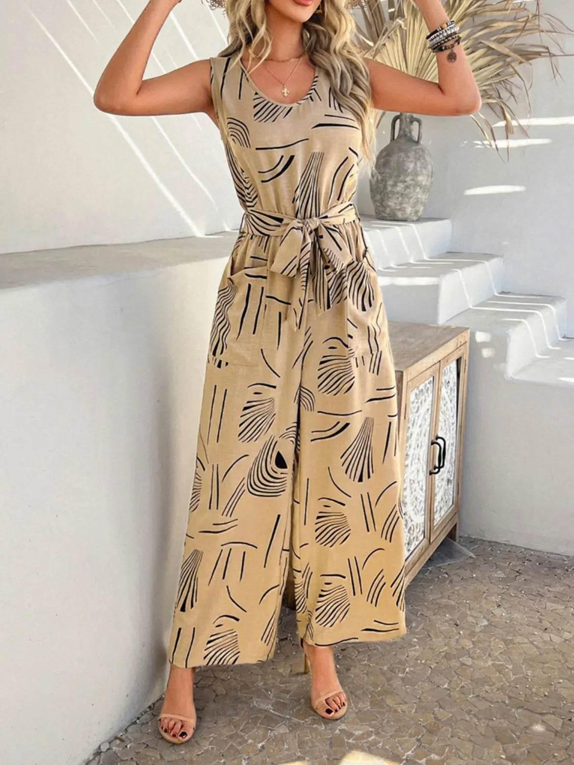 Printed Round Neck Sleeveless Tie Waist Jumpsuit - Velveta Studio