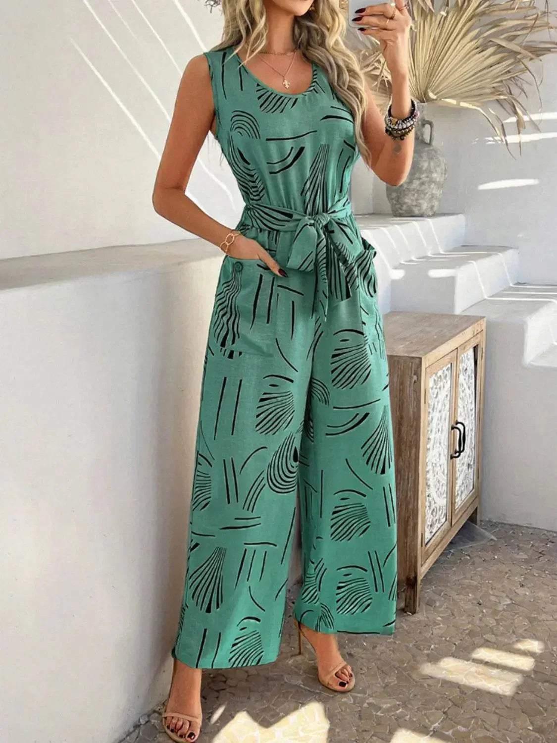 Printed Round Neck Sleeveless Tie Waist Jumpsuit - Velveta Studio