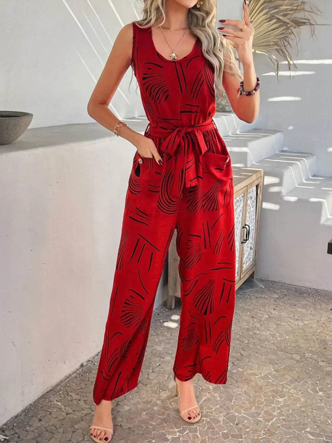 Printed Round Neck Sleeveless Tie Waist Jumpsuit - Velveta Studio