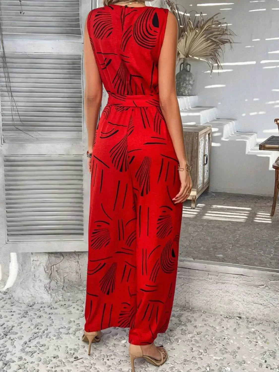 Printed Round Neck Sleeveless Tie Waist Jumpsuit - Velveta Studio
