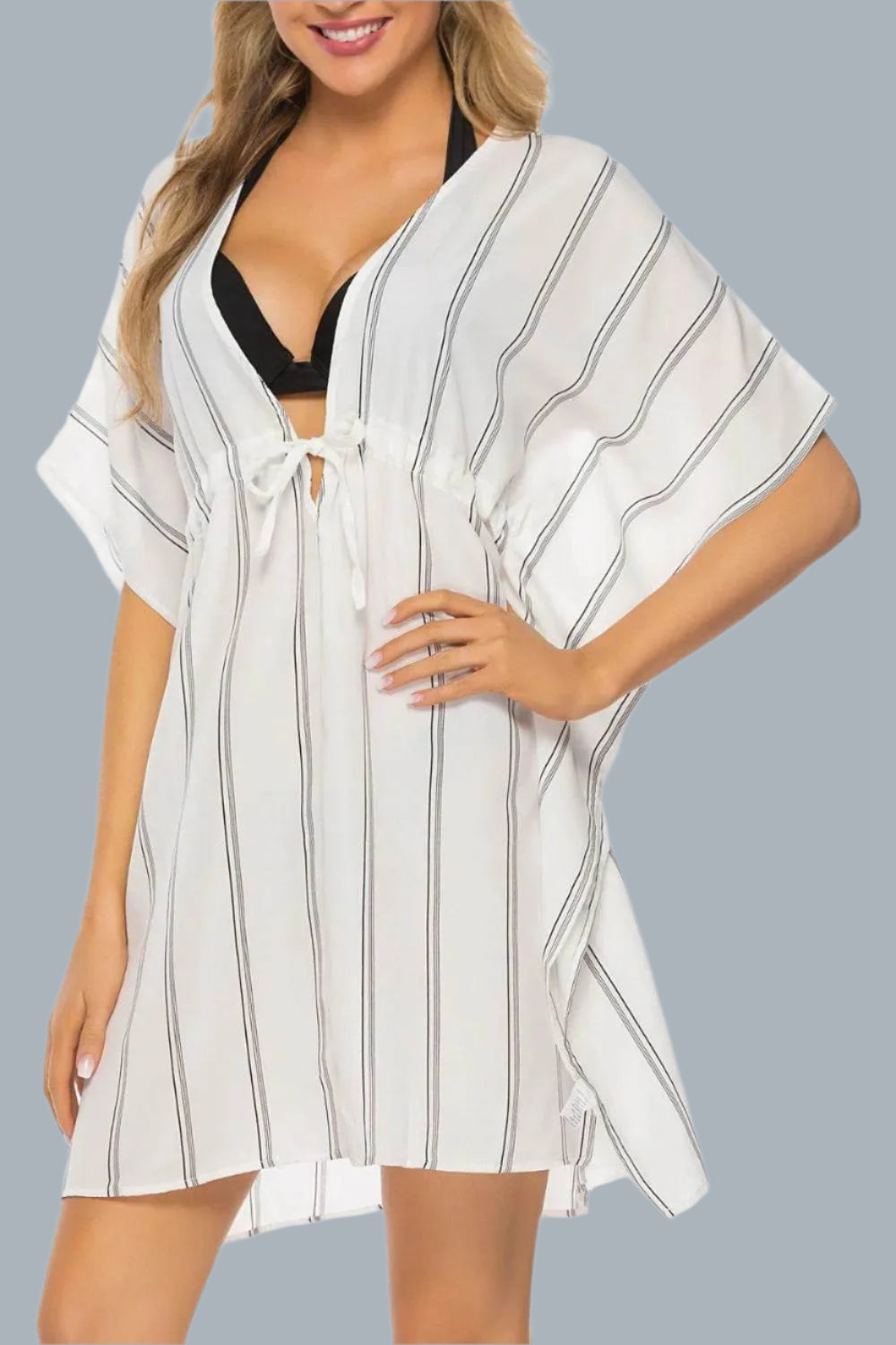Model wearing striped v-neck beach cover-up dress- Velveta Studio