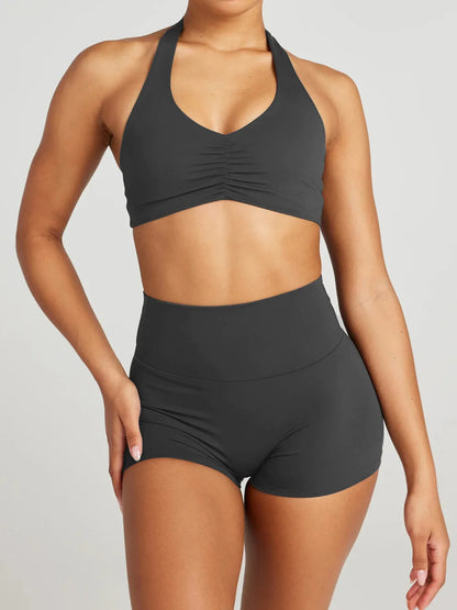 Model wearing halter neck cami and shorts lounge set