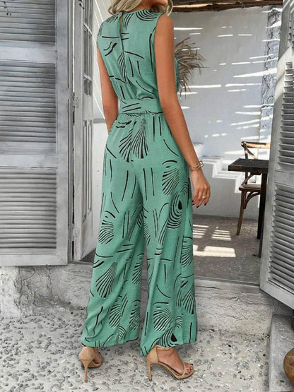 Printed Round Neck Sleeveless Tie Waist Jumpsuit - Velveta Studio