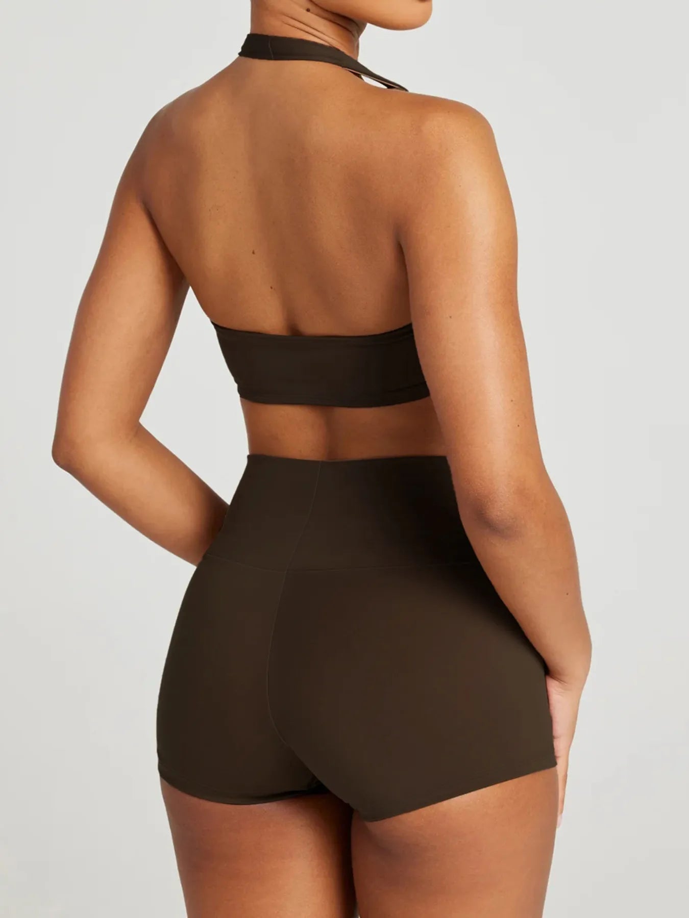 Model wearing halter neck cami and shorts lounge set